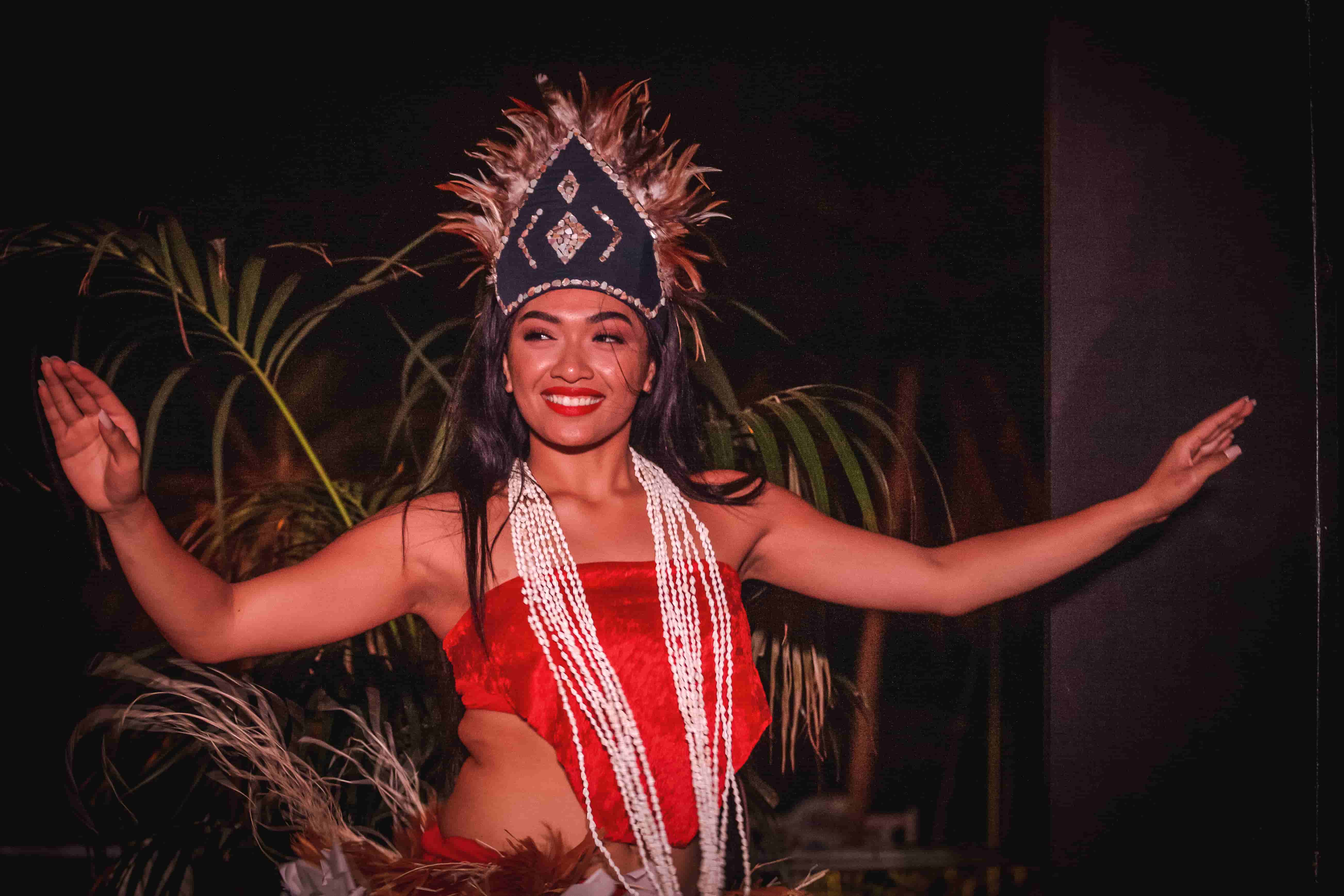 Polynesian dancer with magnificent feathered headdress